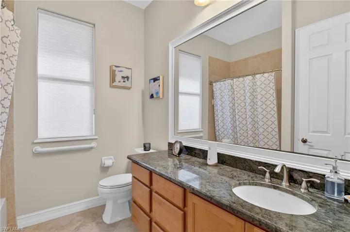 Full bath with vanity and toilet