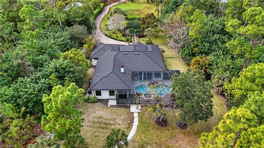 View from above of property featuring a pool