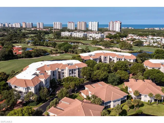 Aerial view of a nearby body of water and a golf course