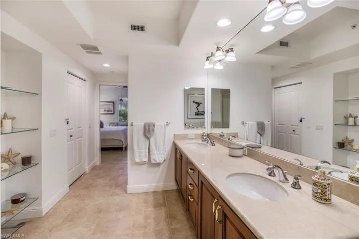 Bathroom featuring vanity and tile patterned floors
