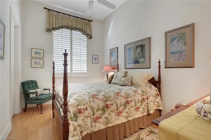 Bedroom with light wood-style flooring and ceiling fan