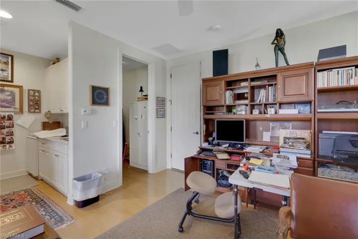 Office space featuring light wood-style floors