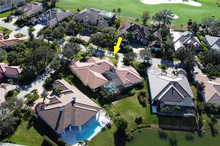 Aerial view of residential area with a golf course