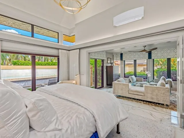 Primary bedroom with access to cocktail spa and den (which can be closed off with folding doors)