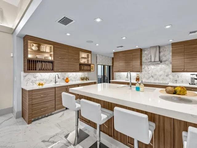 Expansive kitchen with custom tile backsplash