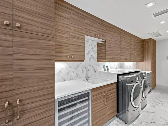 Butler's pantry/laundry room with two wine coolers