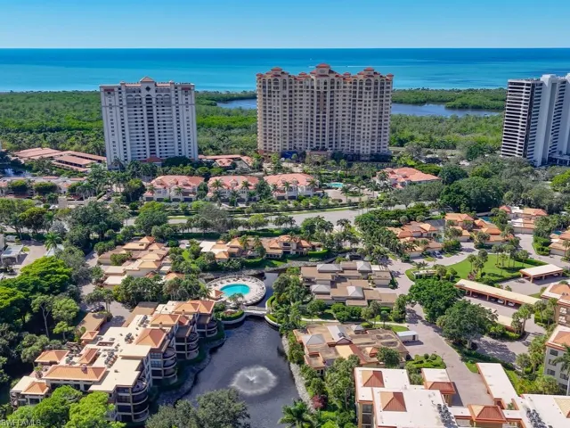 Interlachen -  just across Pelican Bay Blvd to trams/walkways to the beach