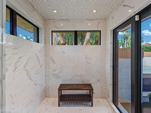 Oversized shower with access to cocktail spa