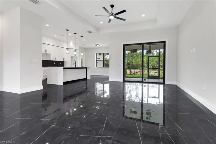 Inviting open concept great room and kitchen area makes entertaining a breeze