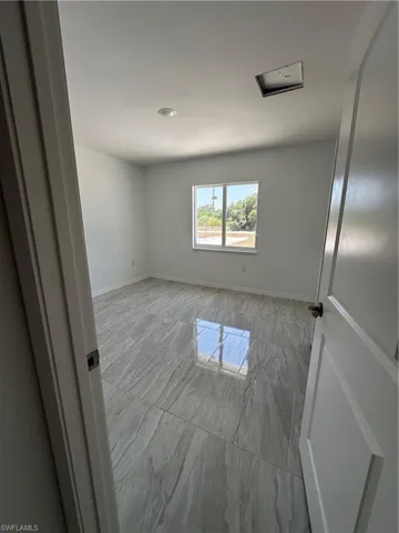 room with light tile flooring