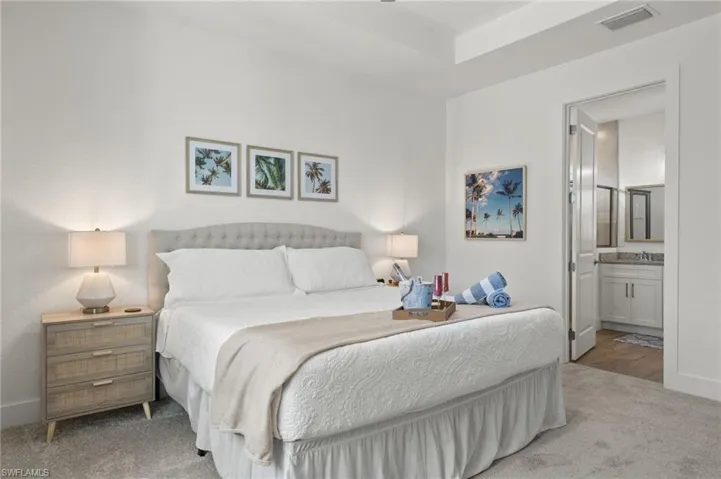 Primary Bedroom w/ adjoining bathroom