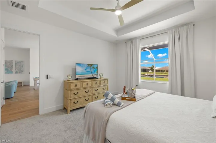 Primary Bedroom w/ Flatscreen TV