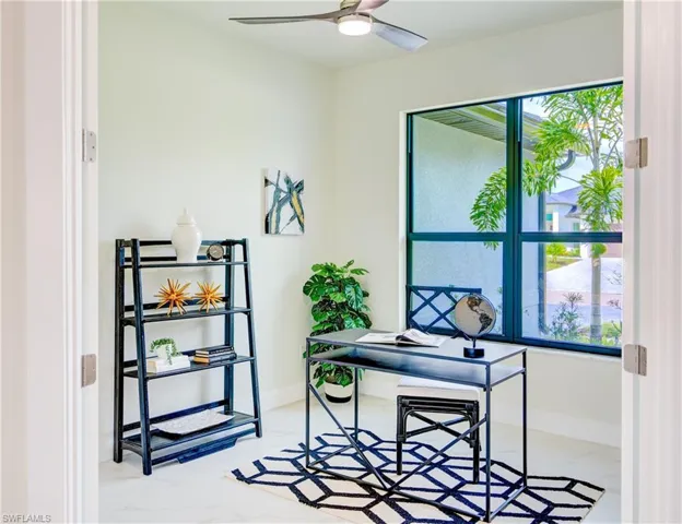 Office/Den area featuring ceiling fan