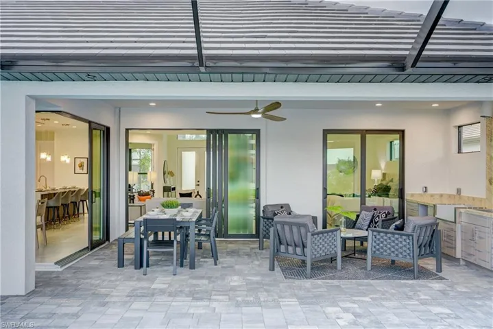 View of patio / terrace featuring an outdoor hangout area and ceiling fan