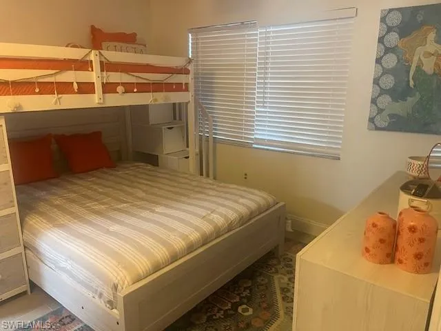 Bedroom featuring baseboards