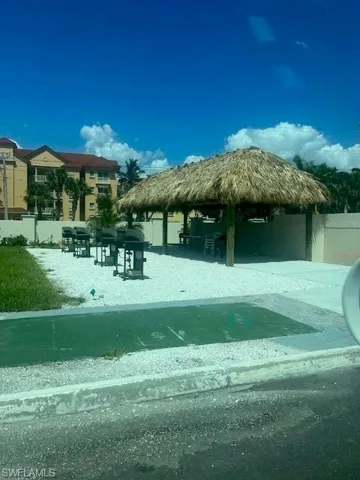 View of home's community with a patio