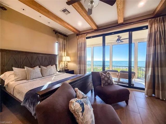 Primary Bedroom 1- Sliding Glass doors leading to large covered porches