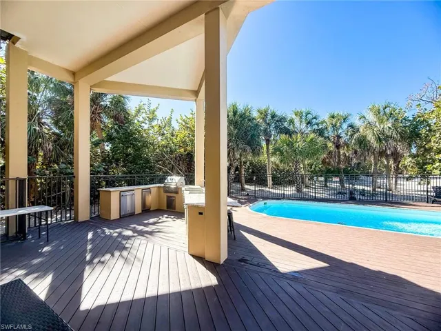 Outdoor Kitchen with Grill, flat top grill, fridge, ice maker...