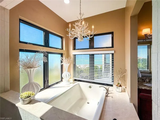 Primary Bedroom 1 deep soaking tub with Gulf views.