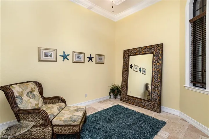 veersatile room....sitting room, 2nd den, living room, library or maybe a  piano room... you choose how to use it best