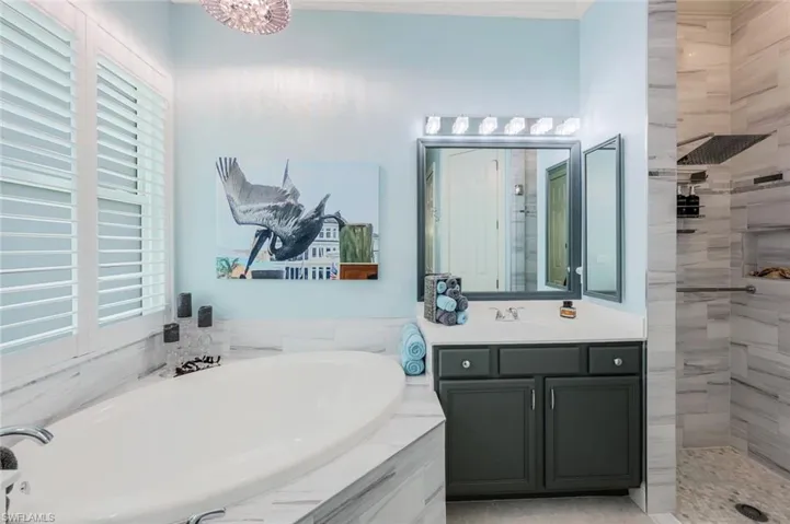His and Hers Vanities, Soaking Garden Tub-all updated w/tasteful tile and appointments