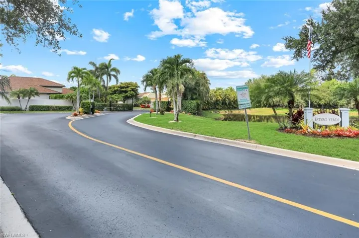 Gated entry, with inviting landscaping and pond as you approach.  Community just west of Hwy 41