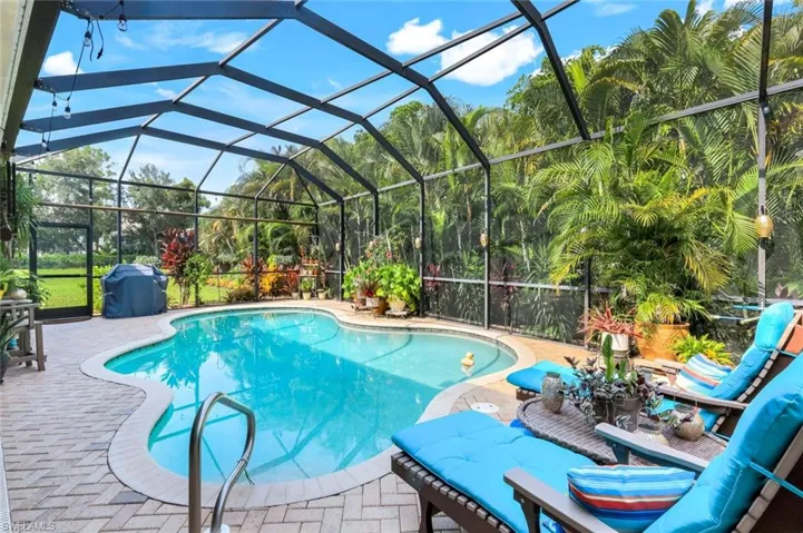 Under truss Lanai with electric Hurricane shutter, roll em down and keep it dry!
