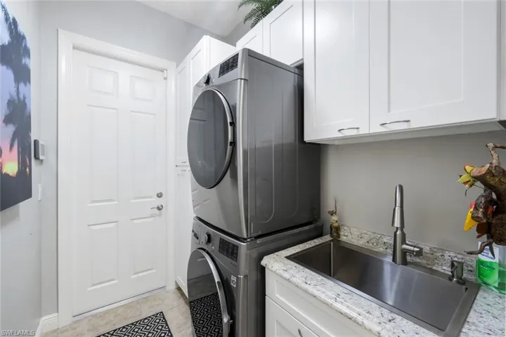 Remodeled in neutral tones, this Guest Bathrm has a lovely updated walk in shower