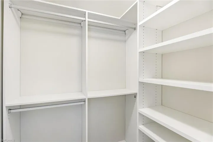 Built-in custom California Closet in spare bedroom
