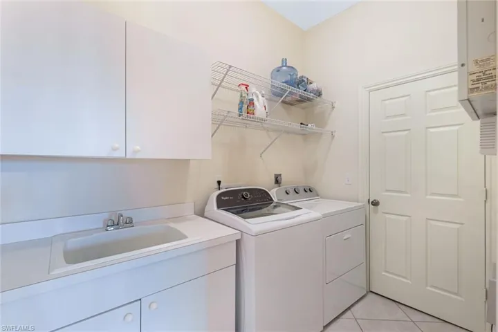 Fantastic laundry room with a utility sink