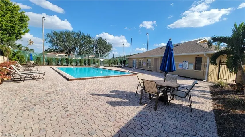 View of pool featuring a patio arcommunity ea