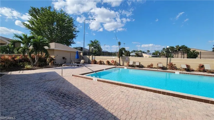 View of community pool with a patio