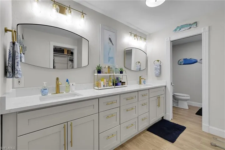 Double vanity with quartz countertops and under-mount sinks