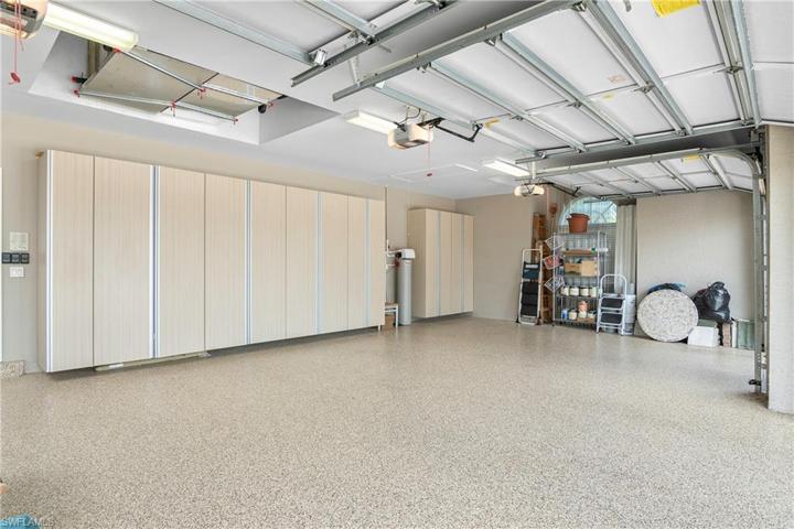 Finished 3-car garage with cabinets