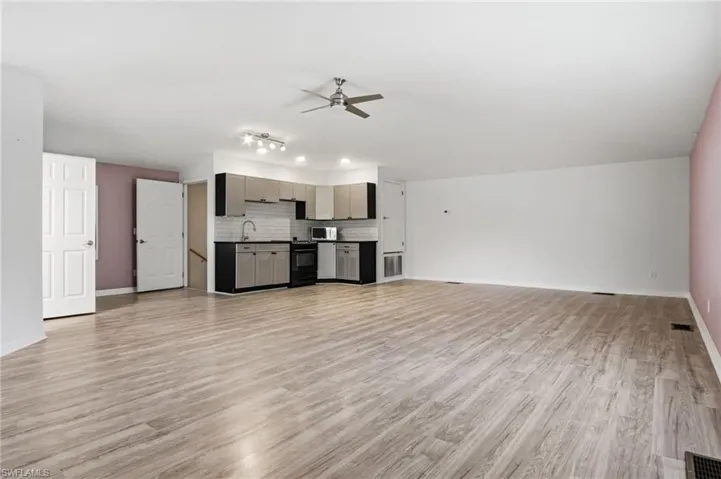 CONCRETE BLOCK DETACHED GARAGE WITH ROOM FOR 4 CARS + UPSTAIRS APARTMENT!