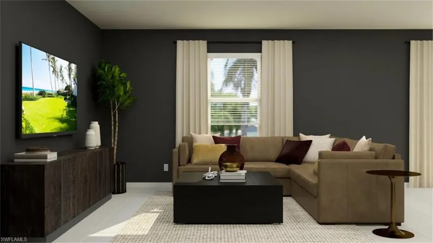 Living area featuring dark gray walls and light flooring