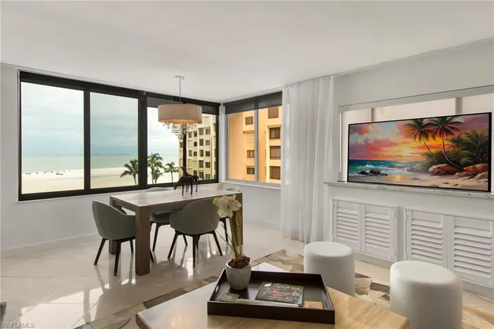 Detailed view of a lit fireplace and baseboards