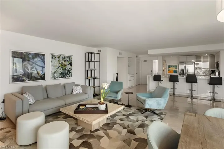 Living room with light tile patterned floors