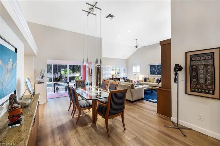 Vaulted ceilings, wood-finish flooring, and recessed lighting