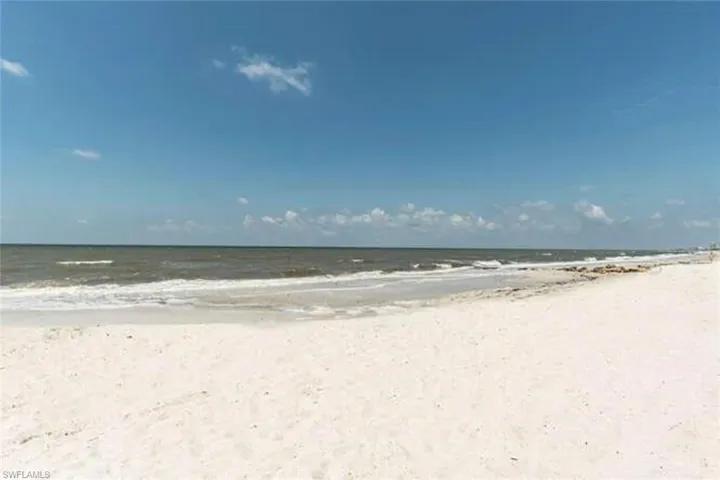 View of water feature with a beach view
