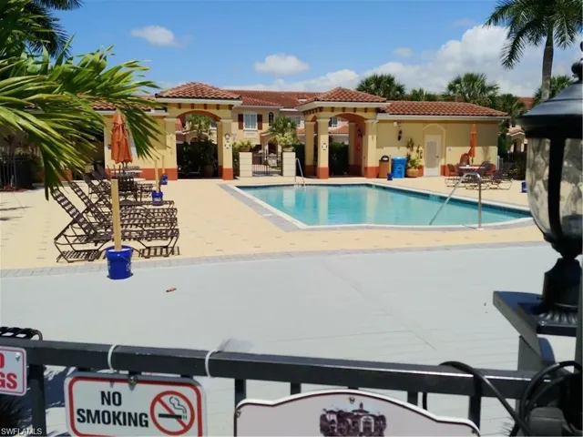 Secondary community swimming pool featuring a patio