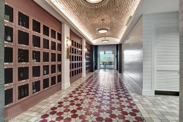 Hallway to the Barrel House Bar featuring private member wine lockers