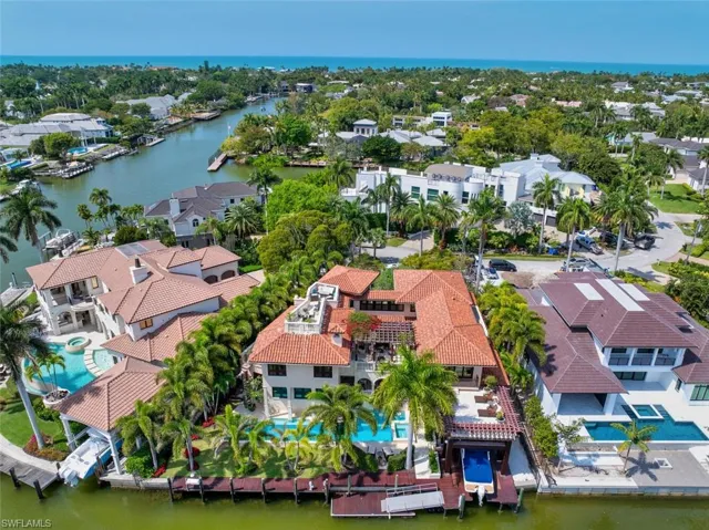 Aerial view of residential area with a large body of water