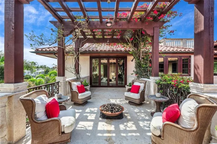 View of patio / terrace featuring french doors and a pergola