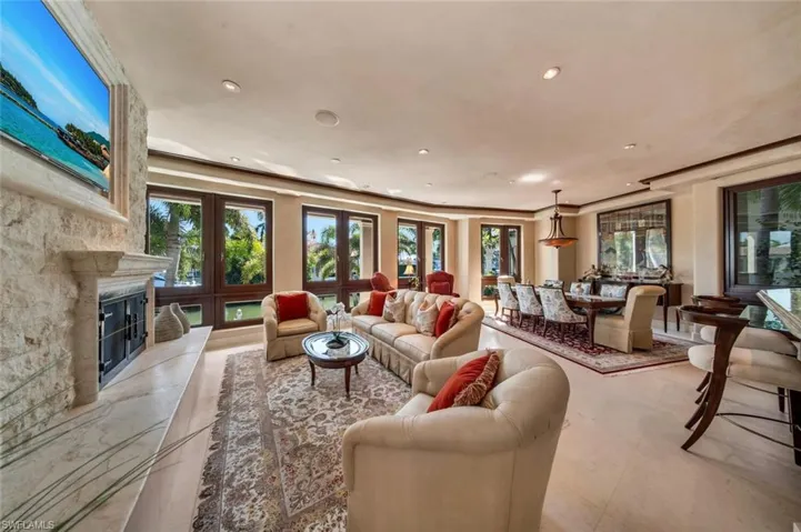 Living area featuring a high end fireplace and recessed lighting