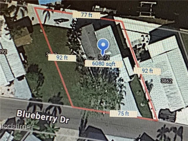 Aerial view showing lot dimensions.