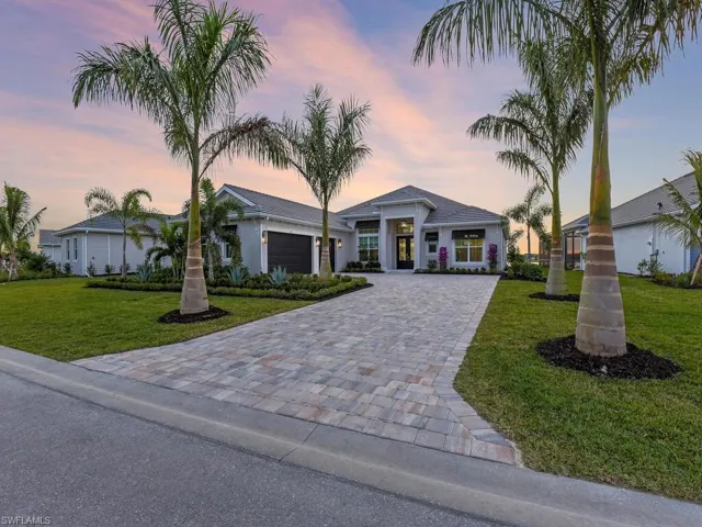New Giant Royal Palm Trees, Calusa Privacy Hedges, Pristine Landscaping, & Awnings over Front Exterior Windows, Tile Front Entry, & Tile Flooring in Garage