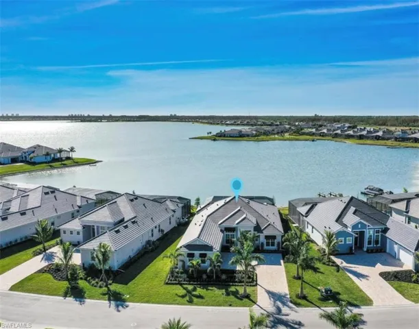 NEW CONSTRUCTION-100% Custom Home-New pristine landscaping, calusa privacy hedges & large royal palms just installed