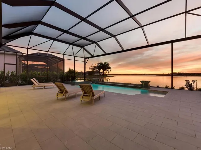 Gas Heated Pool & Spa, Sun Shelf, Picture Screening Lanai, Privacy Calusa Hedges & Beautiful View of the 580-Acre Boatable Lake