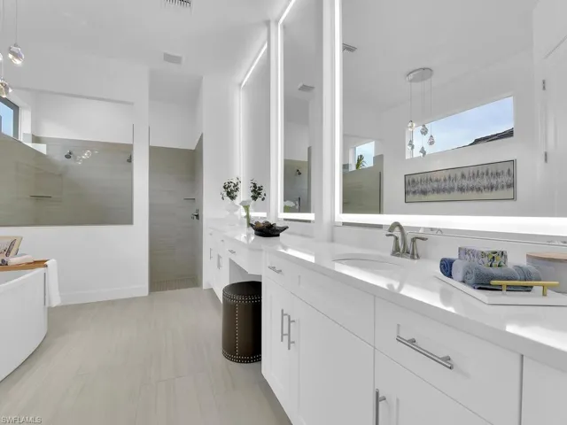 Master Bathroom - Custom Lighted Mirrors to Ceiling, Quartz Counters, Dual Sinks